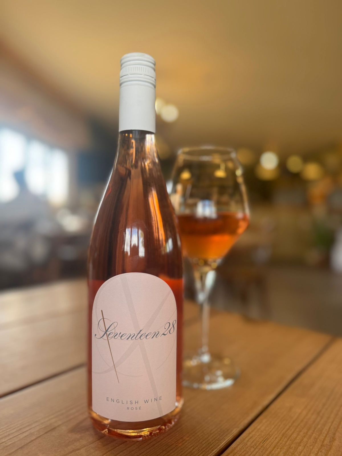 Seventeen28 English Rosé bottle and glass of rosé wine