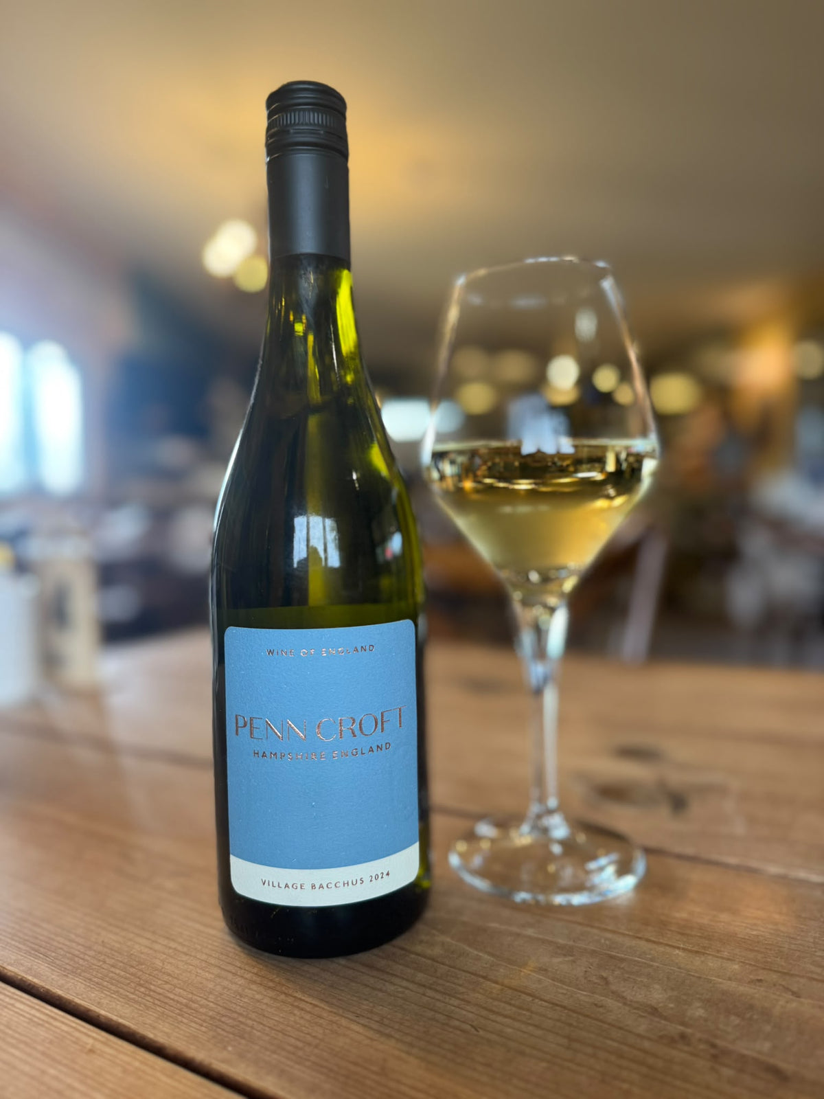 Penn Croft Village Bacchus 2024 bottle and glass of wine